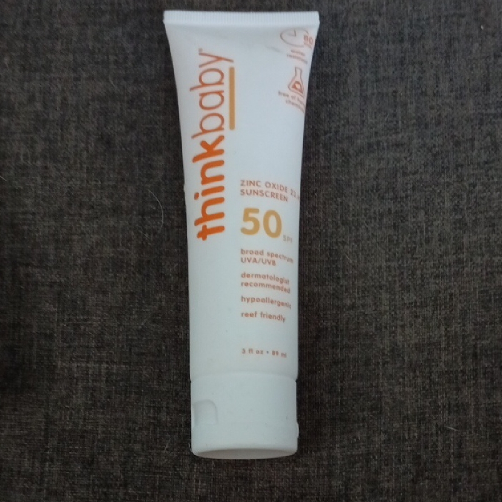 Think! Orange and White Suncare SPF 50 Sunscreen